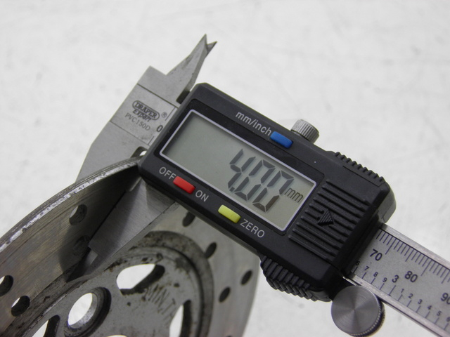 photo de BREMSSCHEIBE VORNE BHM REVENGER 50 (2009 - 2015) - Zoom auf Gebrauchszustand