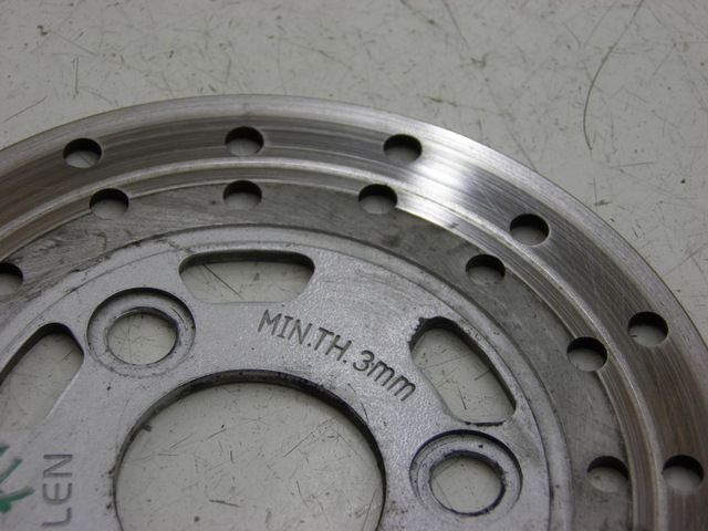 photo de BREMSSCHEIBE VORNE QINGQI SPEEDY 50 (2005 - 2007) - Zoom auf Gebrauchszustand