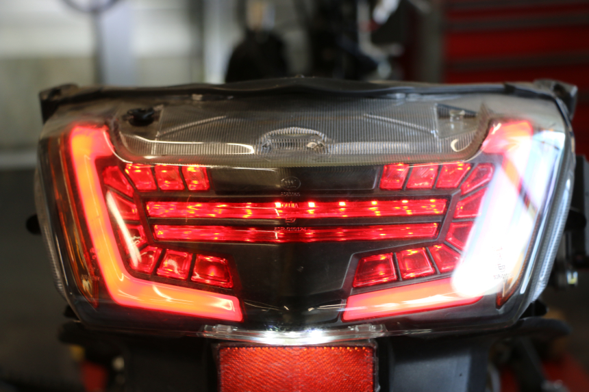 photo de RÜCKLICHT JM MOTORS R-MAX TECH 50 (2024 - 2026) - Zoom auf Gebrauchszustand
