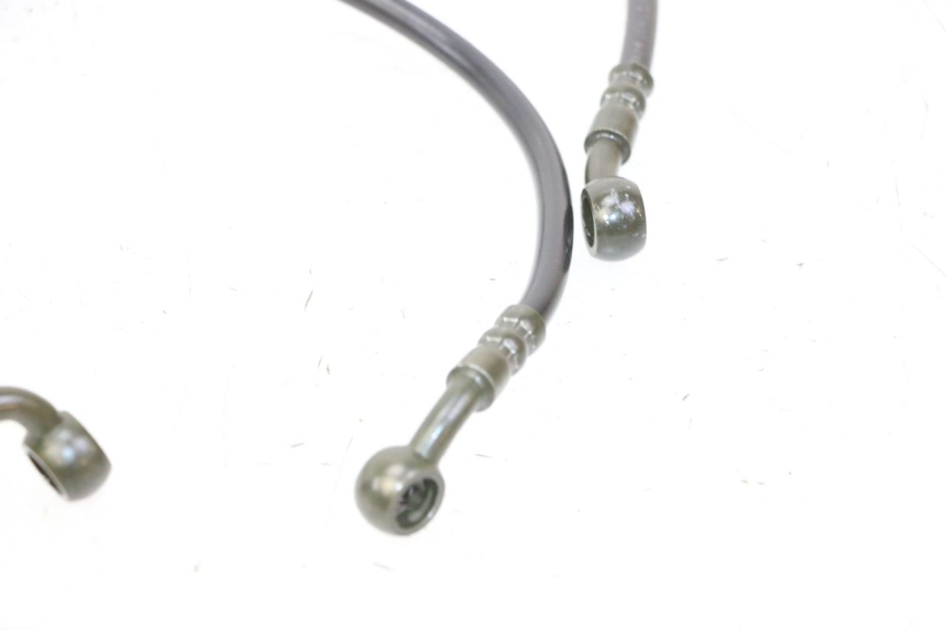 photo de VORDERER UND HINTERER BREMSLEITUNG APOLLO RFZ 125 - Details der Befestigungspunkte