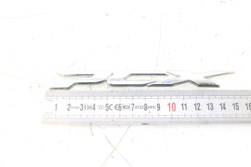 photo de MARKENLOGO HONDA PCX (JF28) 125 (2009 - 2011) - Detailansicht des Bauteils
