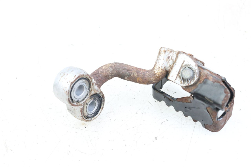 photo de Vorderes linkes Fußrastenblech HYOSUNG XRX 125 (2000 - 2008) - Zoom auf Gebrauchszustand